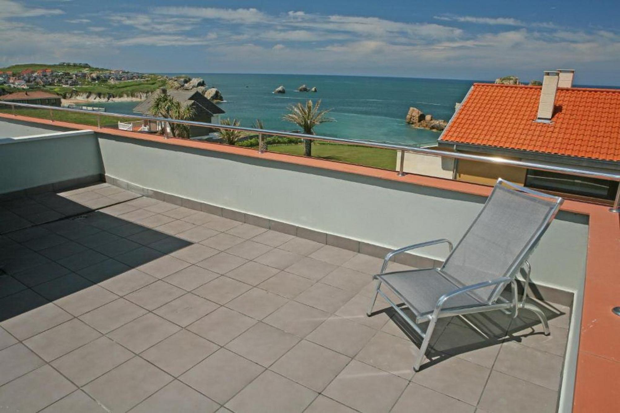 Apartamentos Playa De Portio Liencres Eksteriør billede